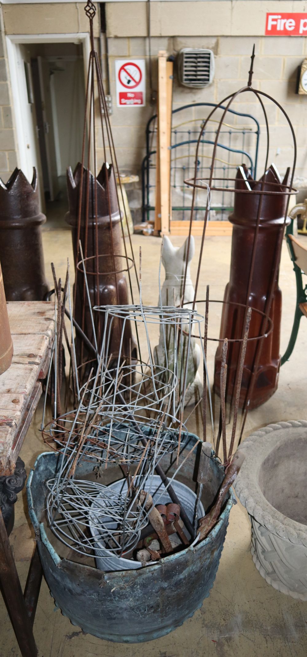 Two wrought iron garden frames, tub, etc.